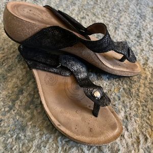 Taos thong sandals.